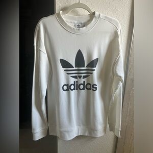 Adidas Sweater great to wear with leggings. Long enough to go over your bum.